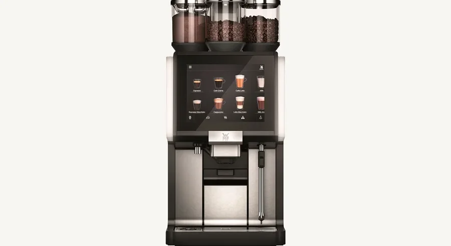 Kaffeemaschine mit Display und drei Kaffeebehältern.