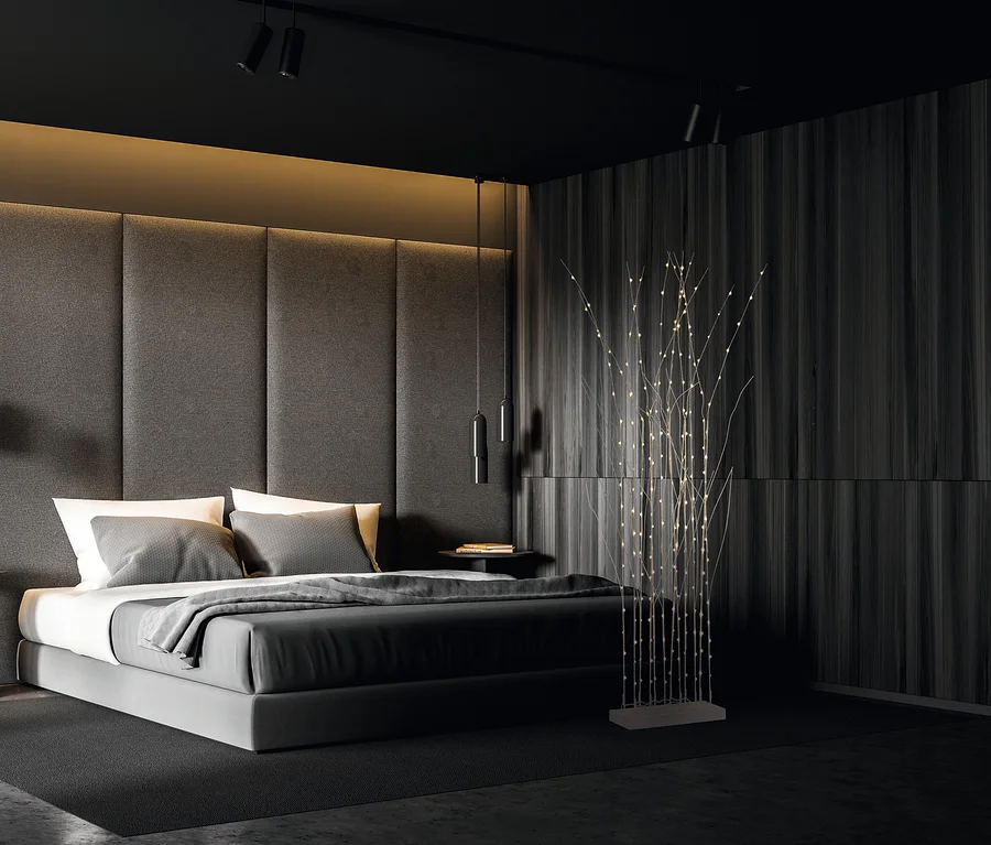 Schlafzimmer mit grauem Bett, Nachttischen und einem LED-Lichtelement. Im Raum steht ein MAXXMEE-LED-Raumtrenner, ca. 150 cm, 4,5 V, weiß.