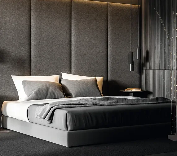 Schlafzimmer mit grauem Bett, Nachttischen und einem LED-Lichtelement. Im Raum steht ein MAXXMEE-LED-Raumtrenner, ca. 150 cm, 4,5 V, weiß.
