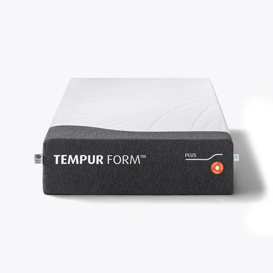 Eine Tempur Form™ Plus Matratze, fest, mit einer weißen Oberfläche und grauen Seiten.
