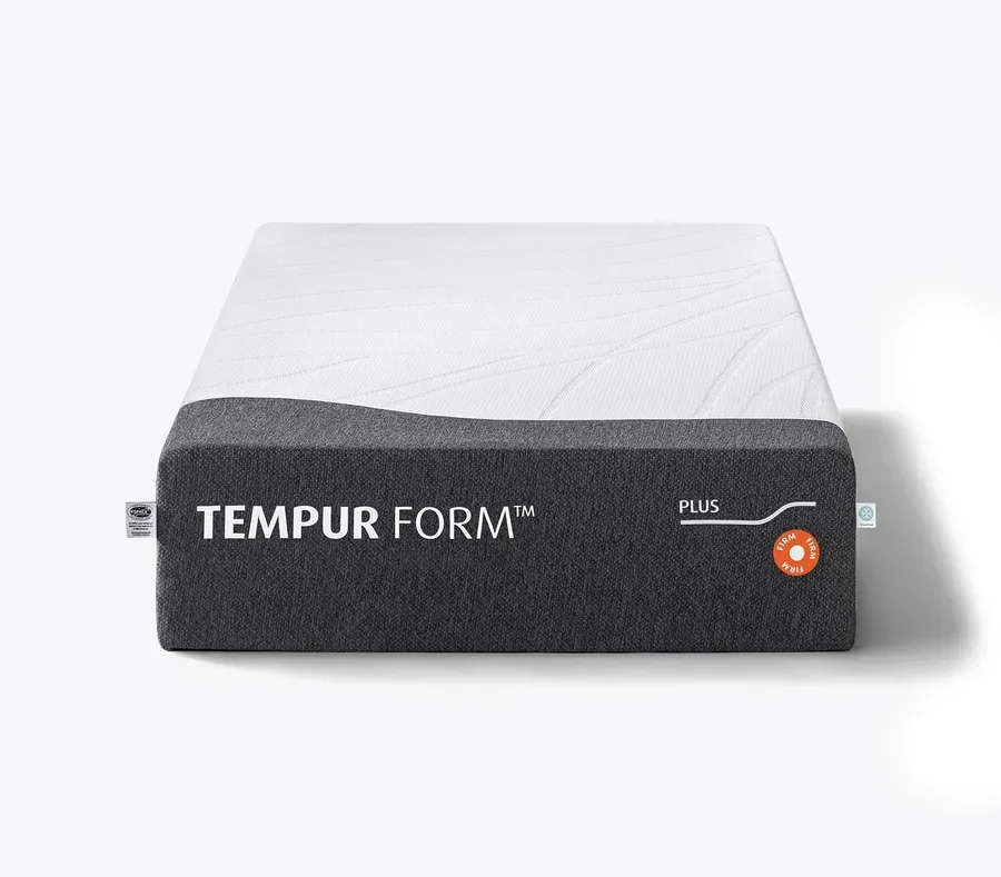 Eine Tempur Form™ Plus Matratze, fest, mit einer weißen Oberfläche und grauen Seiten.