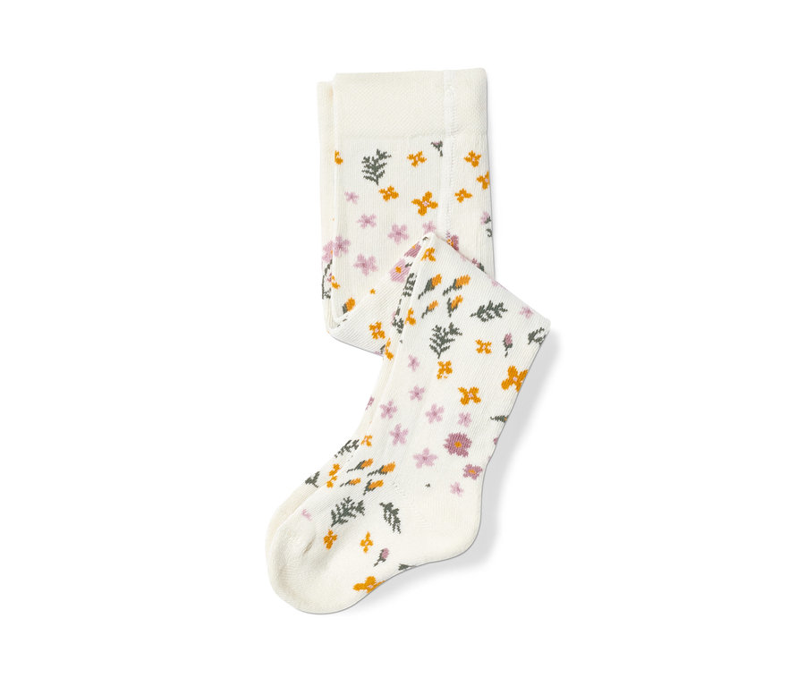 Detail einer weißen Strumpfhose mit Blumenmuster, 5 Paar.