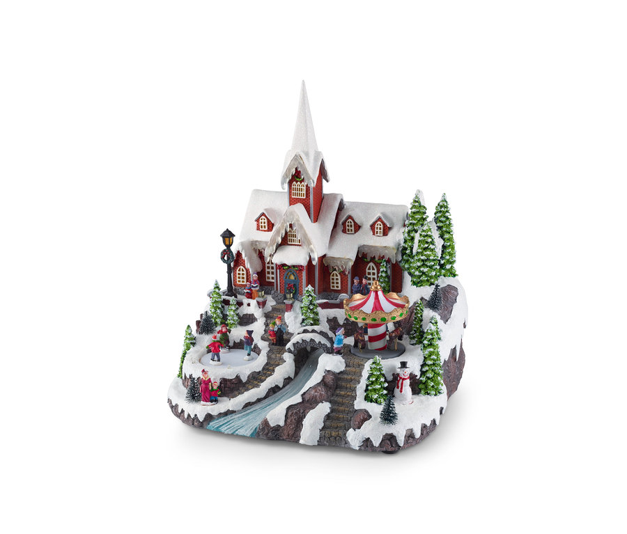 Beleuchtete Miniatur Luville – Bergdorf mit Kirche einer verschneiten Landschaft mit Kirche, Schlittschuhläufern und Karussell.