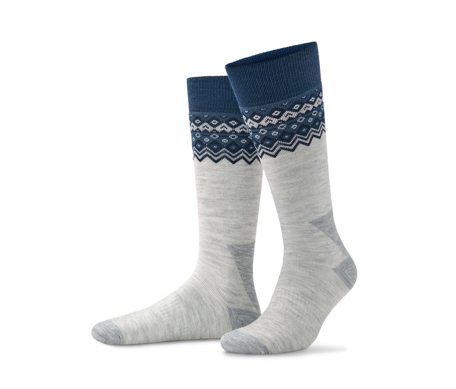 Zwei Thermokniestrümpfe mit Merinowolle, grau mit blauem Norwegermuster.