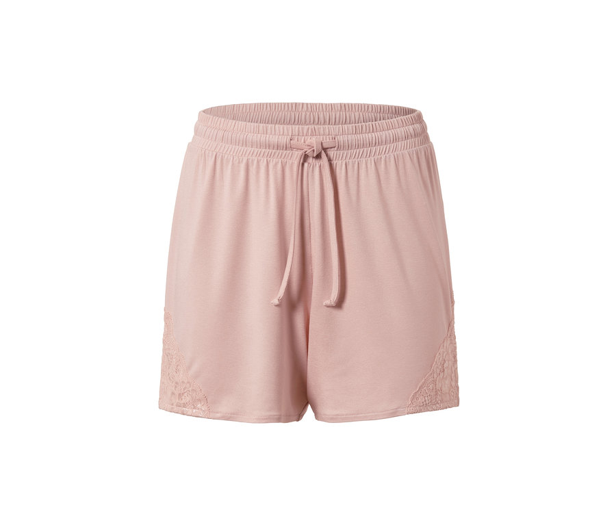 Nahaufnahme der rosafarbenen Shorty-Pyjama mit Spitze an der Seite.