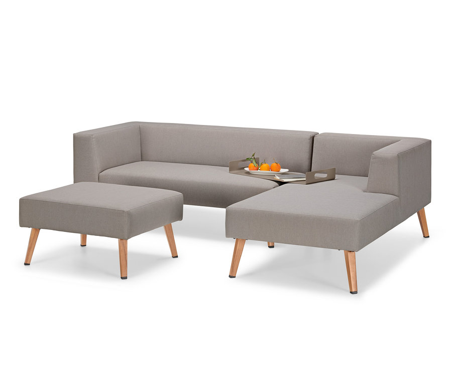 Graues Premium-Lounge-Set mit Sitzhocker, Tablett und Orangen.