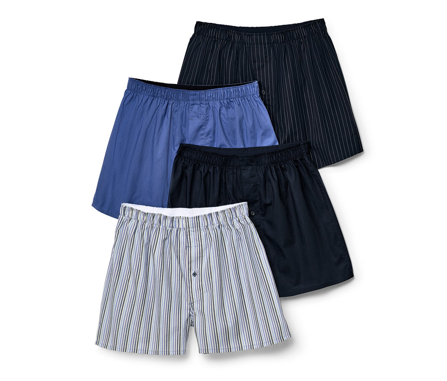 Vier Web-Boxershorts in Blau, gestreift und Dunkelblau.