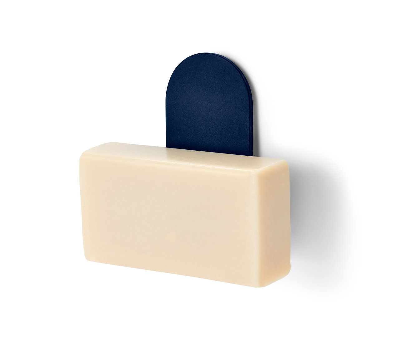 Seifenhalter mit Magnet und beiger Seife.