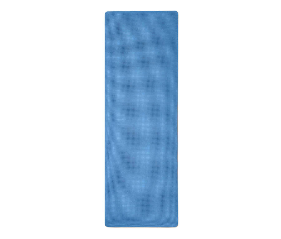 Eine blaue Yoga-und-Fitnessmatte liegt auf dem Boden.