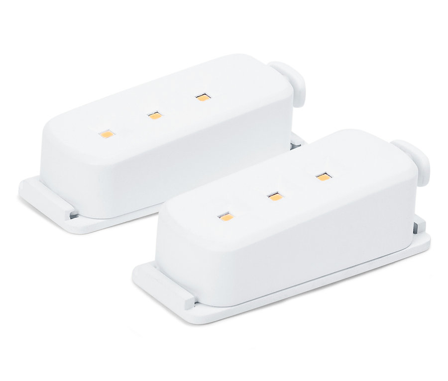 Zwei weiße Elektronikmodule mit LEDs auf weißem Hintergrund.