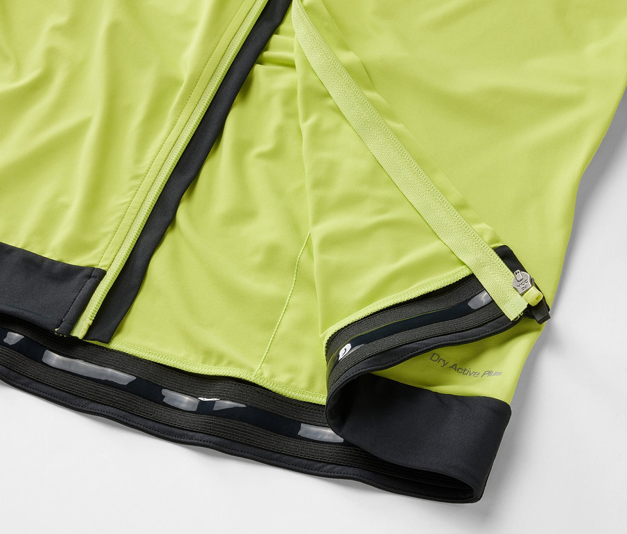 Detailansicht eines gelben Fahrrad-Trikots mit Reißverschluss.