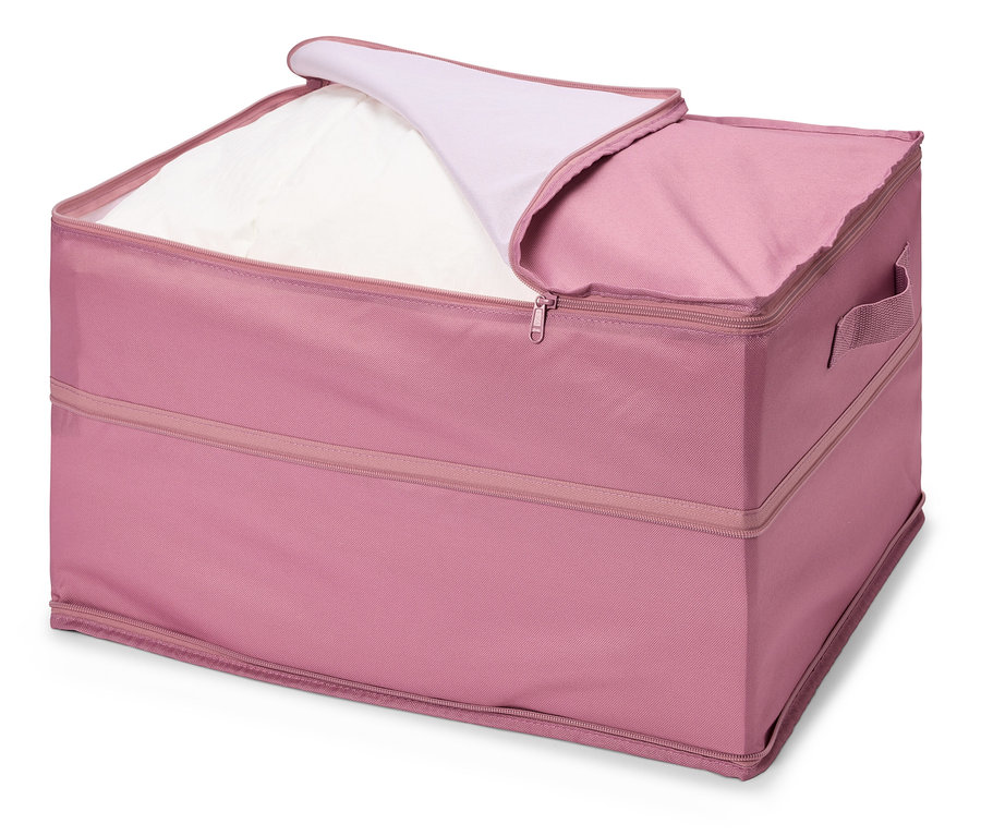 Rosa Aufbewahrungsbox mit teilweise geöffnetem Reißverschluss und weißer Wäsche im Inneren.