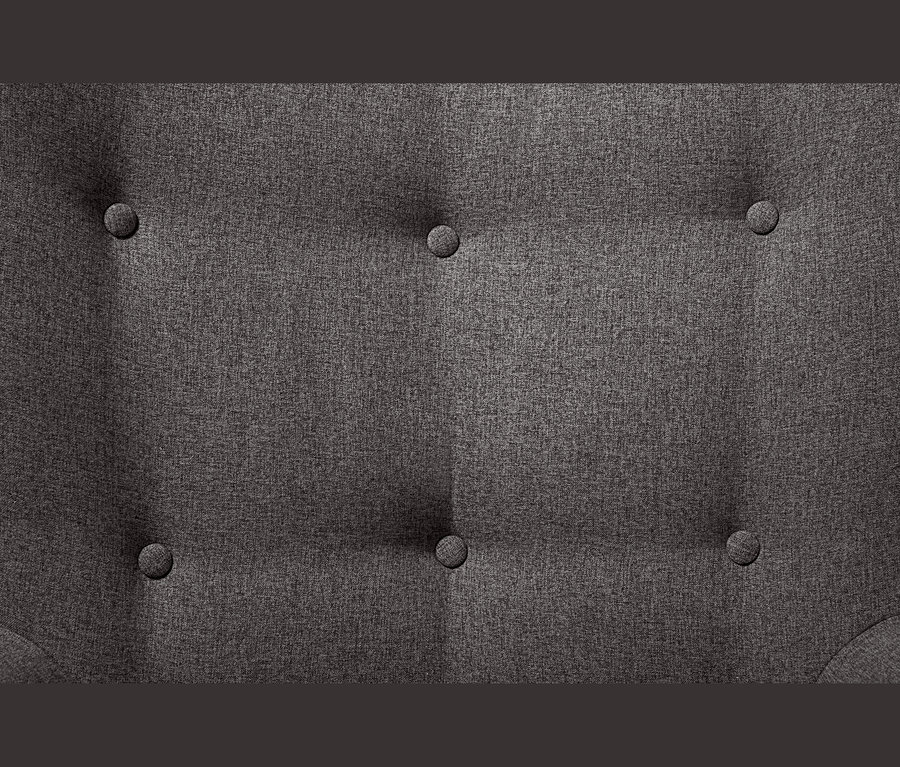 Detailansicht der Knopfleiste eines dunkelgrauen Einzelsessels mit Fußhocker.