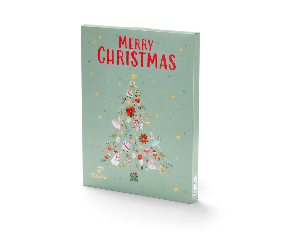 Ein grüner Tchibo Adventskalender mit der Aufschrift Merry Christmas und einem Weihnachtsbaum.