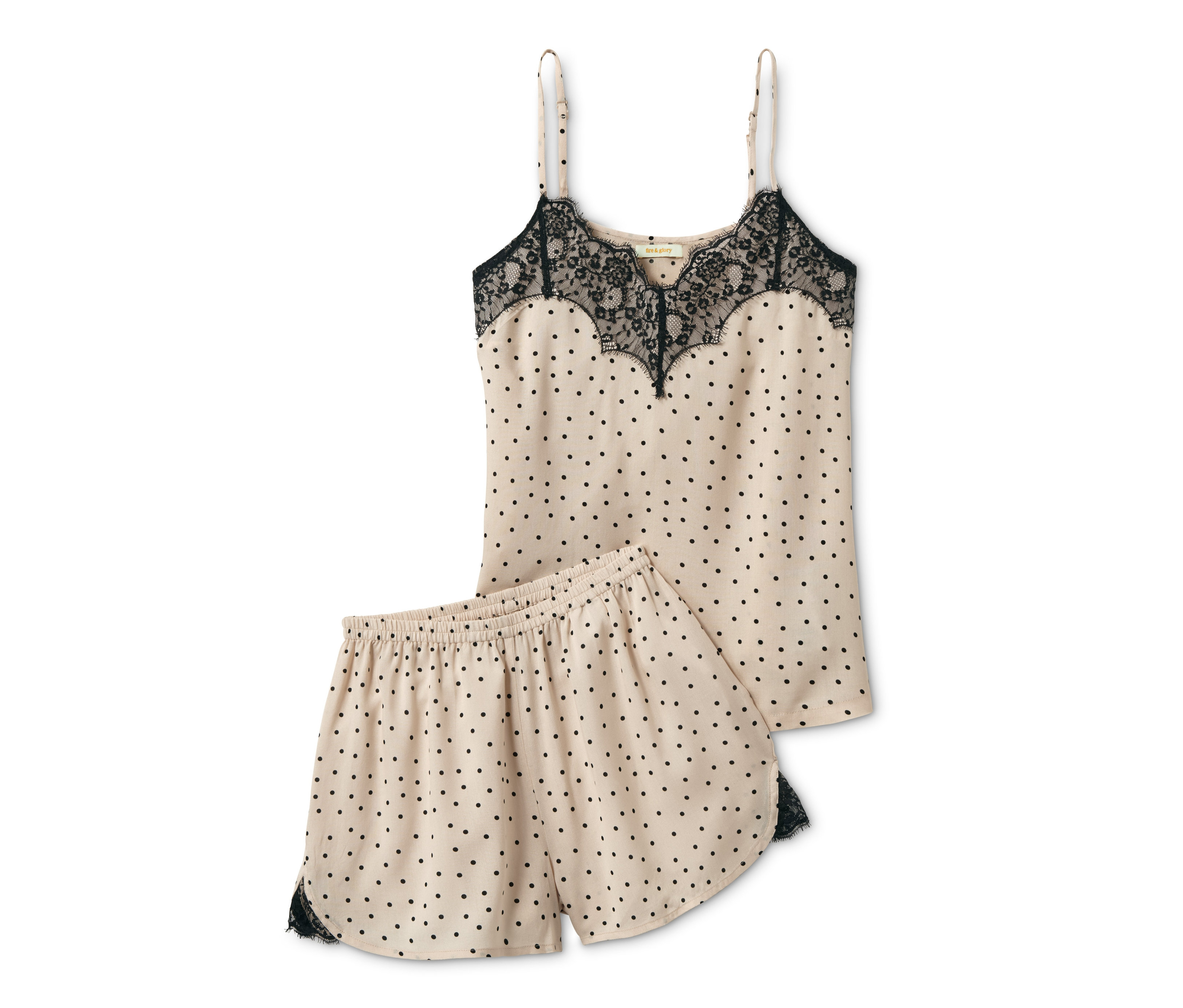 Ein Shorty-Pyjama mit schwarzer Spitze und Punkten.