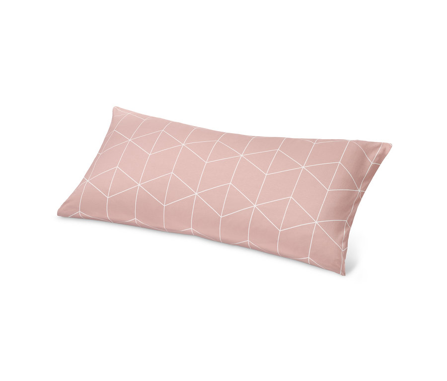 Ein rosa Kopfkissenbezug mit einem geometrischen Muster.