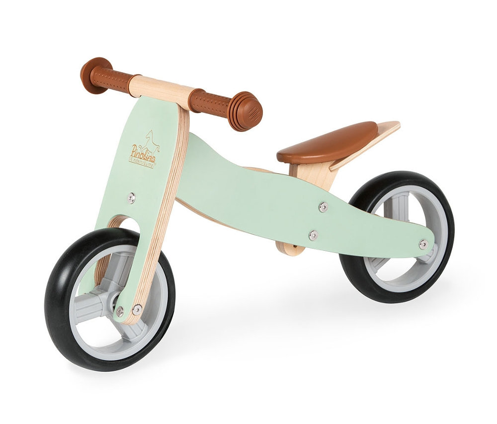 Mintfarbenes Pinolino Mini-Laufdreirad »Charlie« mit braunem Sattel und Griffen.