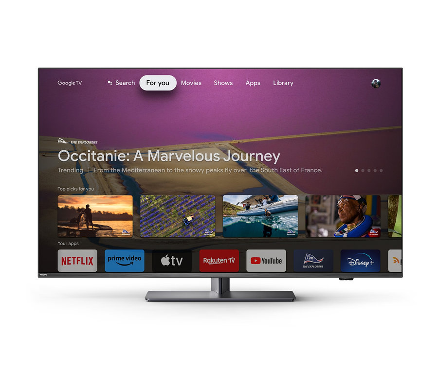 Ein Philips 4K UHD Ambilight TV mit Google TV zeigt das Menü der Streaming-Apps.