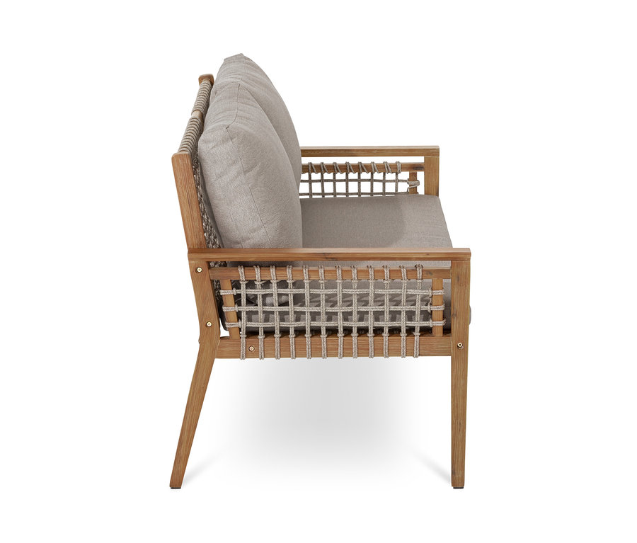 Seitenansicht eines Lounge-Sets mit Textilgeflecht und grauen Kissen.