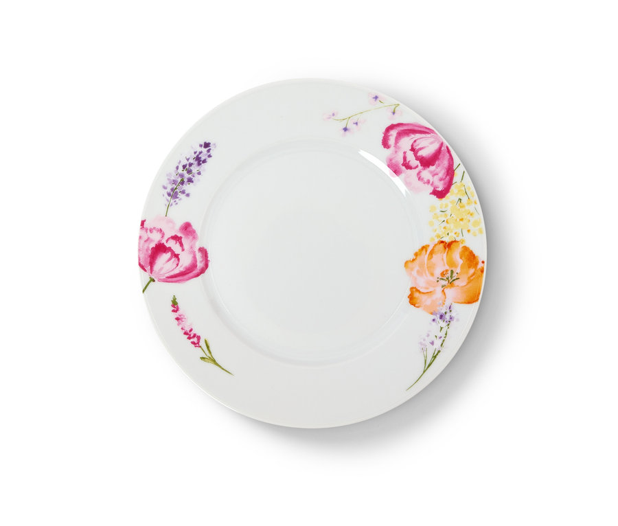 Weißer Teller des 6-teiligen Kaffeegedecks mit Blumendekor.