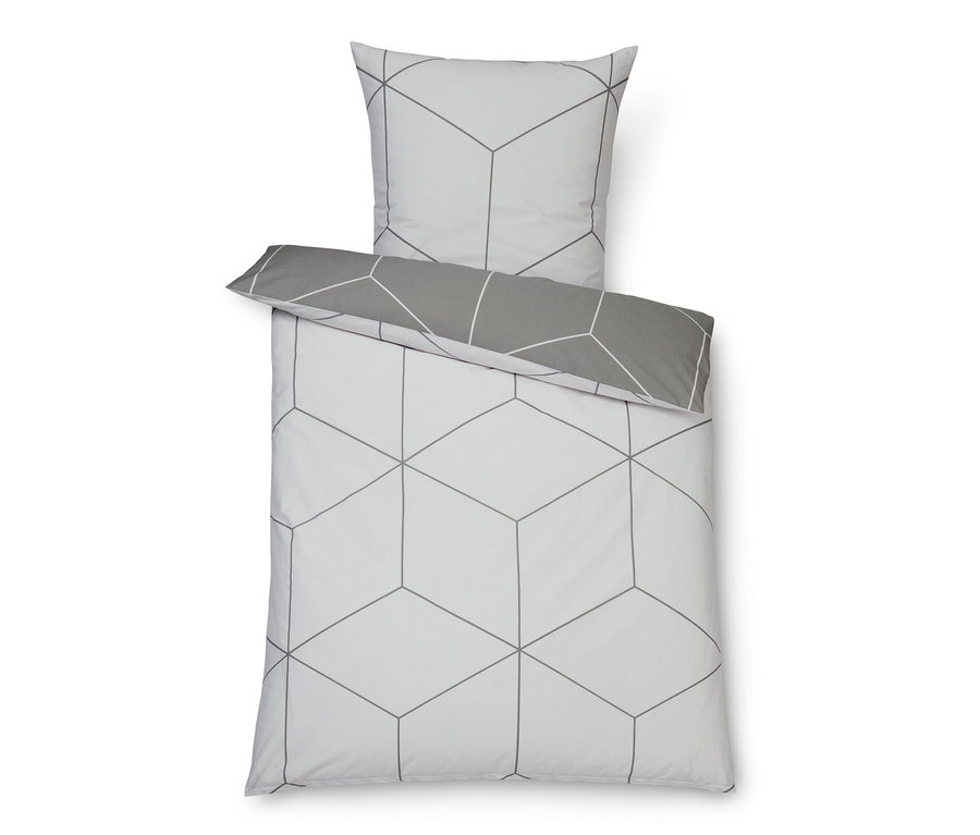 Weiße Bettwäsche mit geometrischem Würfelmuster und grauem Rand.