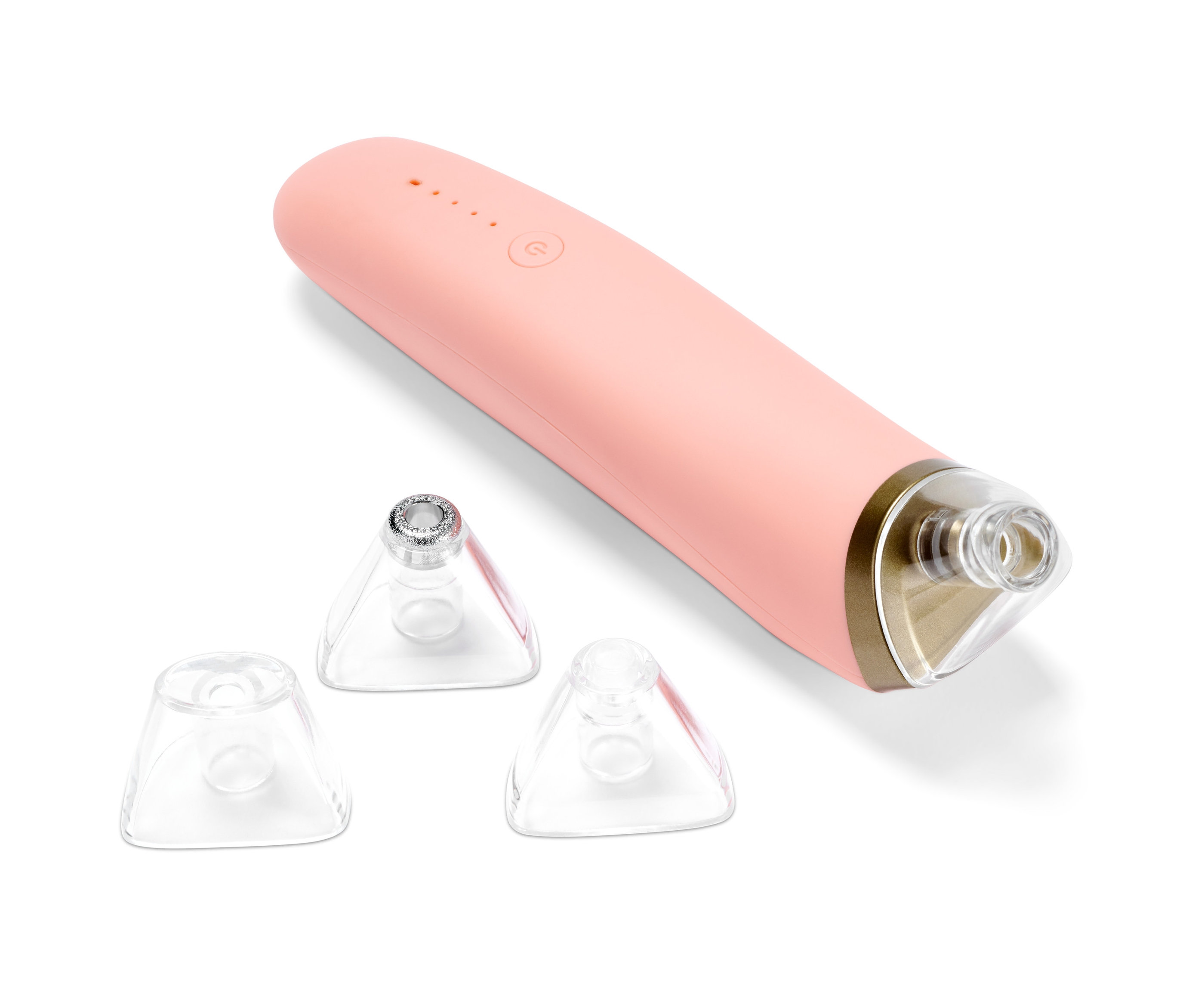 Ein rosafarbener Porenreiniger und drei Aufsätze.