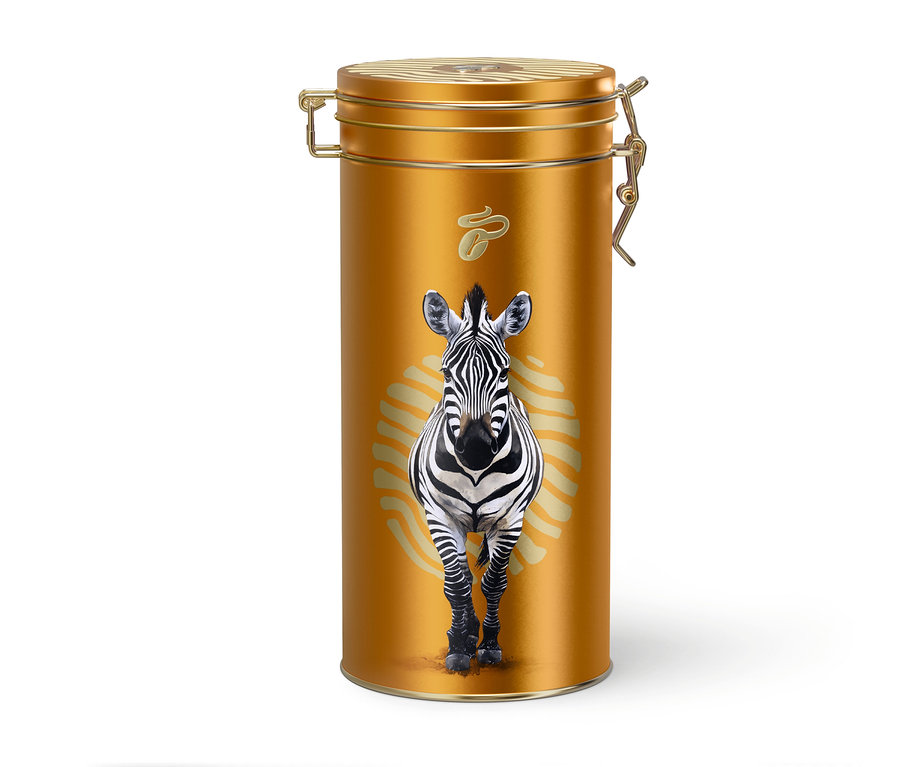 Goldene Kaffeedose mit Zebra-Motiv.
