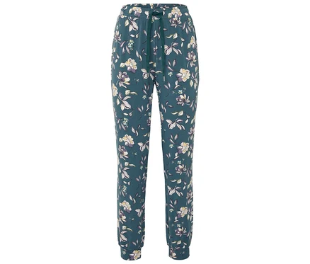 Eine lange, grüne Hose mit Blumenmuster.