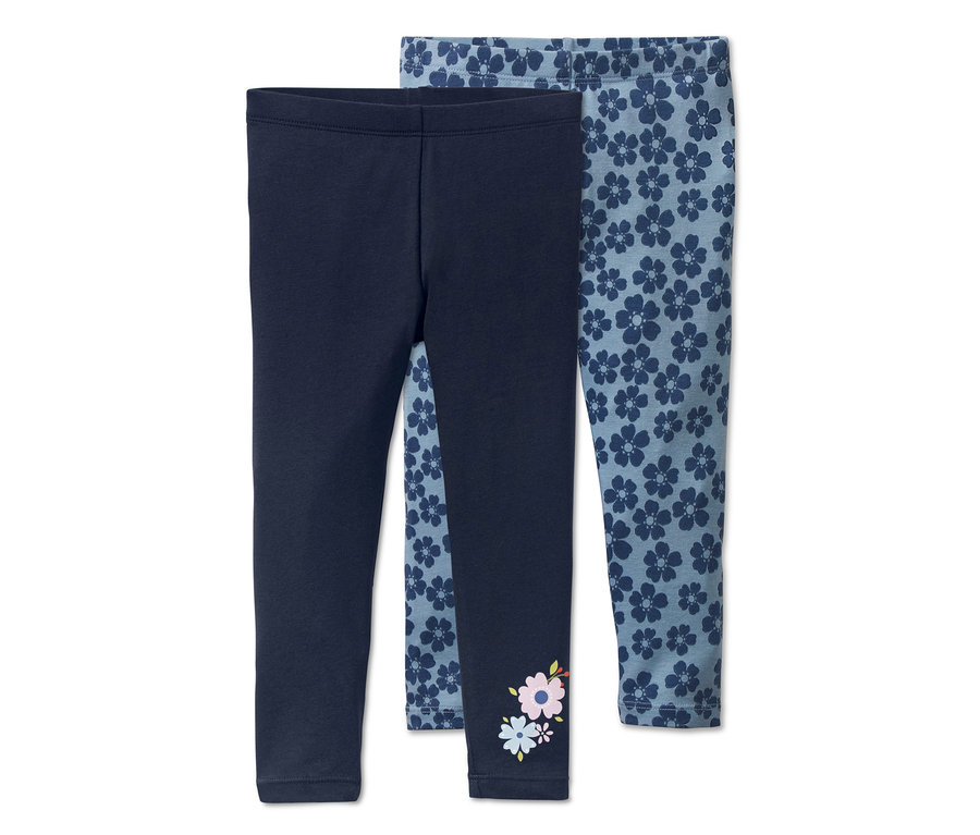 Zwei Leggings, eine dunkelblau, die andere hellblau mit Blumenmuster.