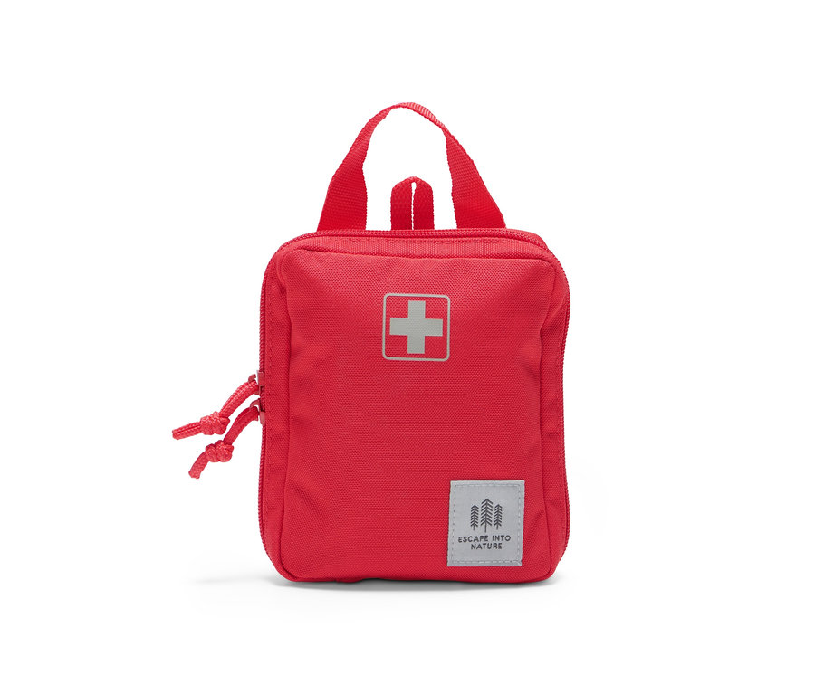 Rote Erste-Hilfe-Tasche mit Griff, Reißverschluss und weißem Kreuz in der Mitte.