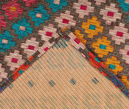 Detailansicht eines mehrfarbigen Kayoom Kurzflorteppichs »Primavera 225« mit Blumenmuster.