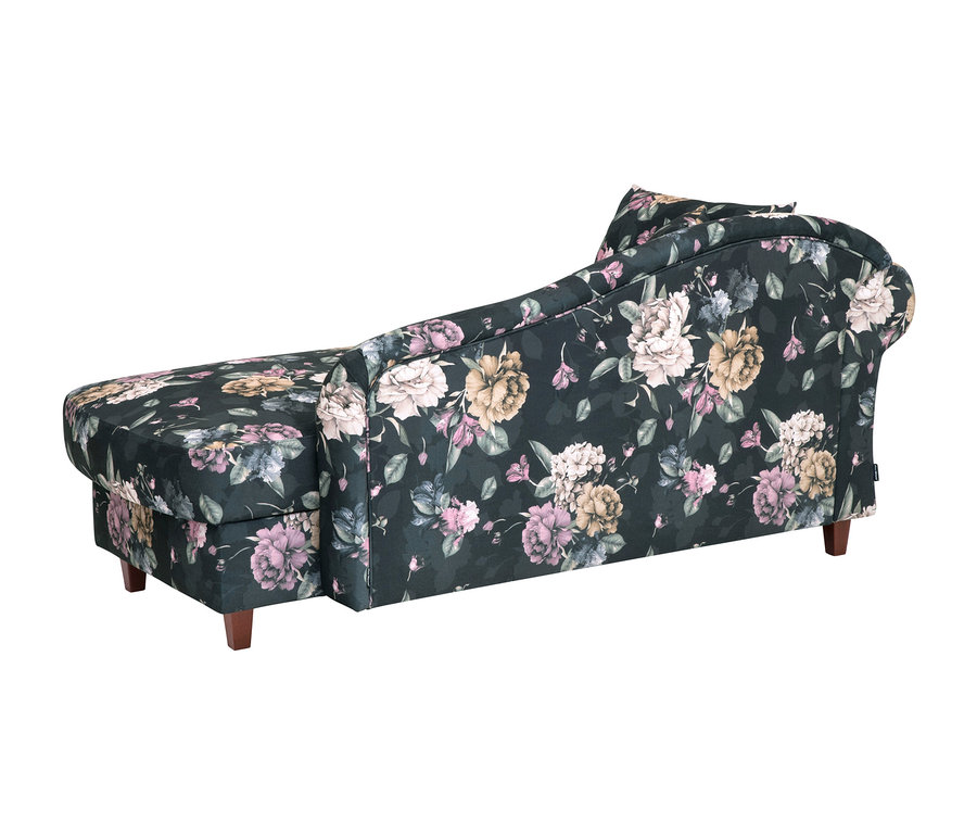 Blick von hinten auf eine blumengemusterte Recamiere „Evelyn“ links.