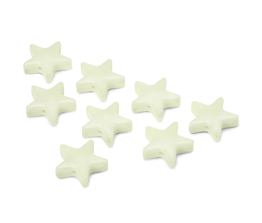Acht nachtleuchtende Markierungsclips in Sternform liegen auf einer weißen Fläche.