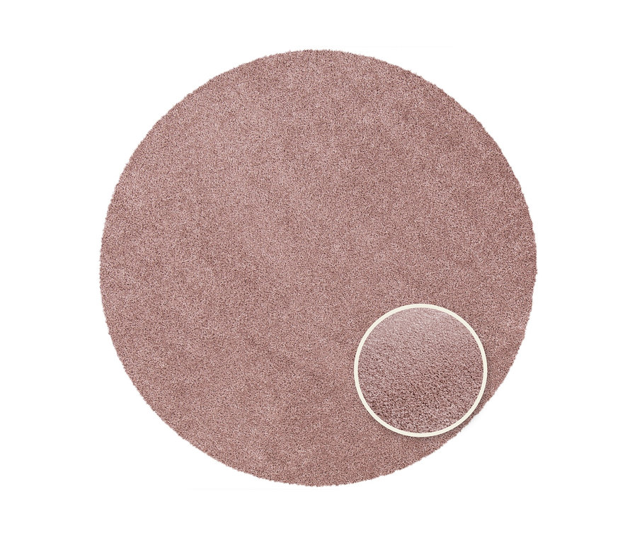 Nahaufnahme eines runden, pinken Teppichs "Charme" mit kurzem Flor.