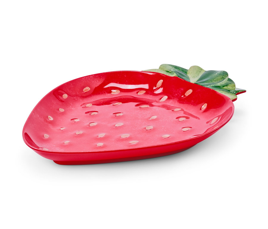 Ein roter Servierteller in Form einer Erdbeere.