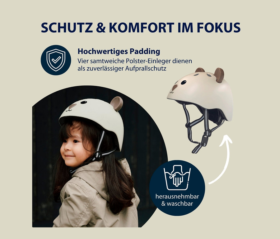 Mädchen trägt HUDORA Kinderhelm, Beary, 44–47 cm.