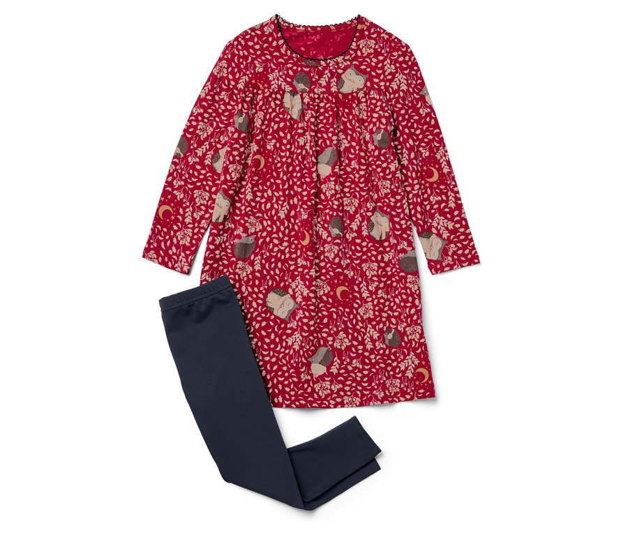 Ein rotes Kleid mit Igelmuster liegt neben dunkelblauen Leggings.