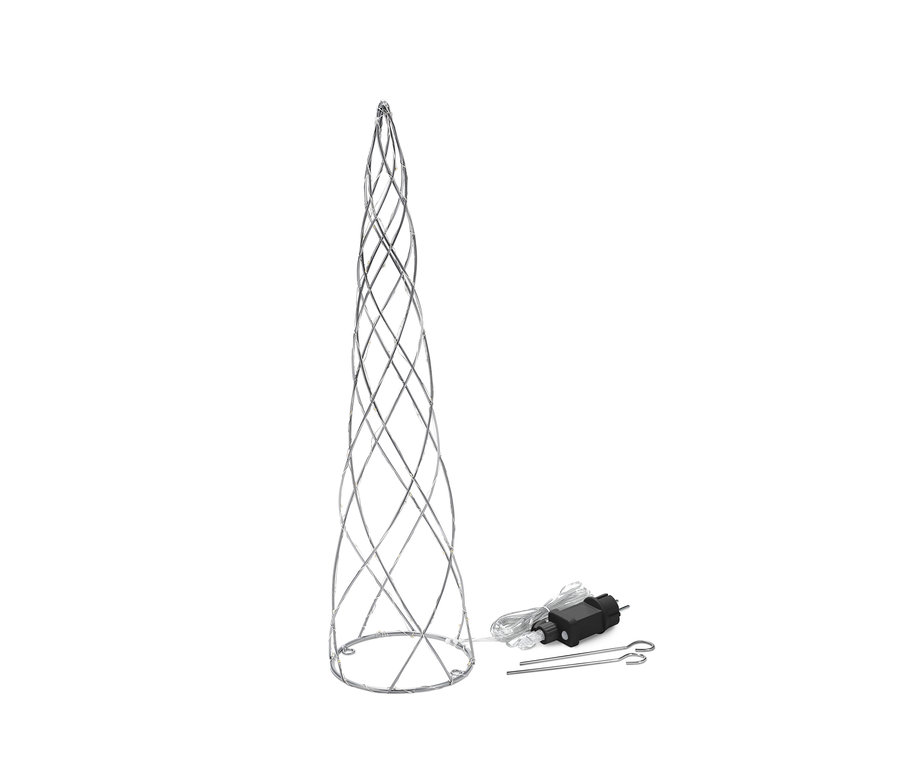 Ein LED-Metallbaum mit Netzteil und Heringen liegt auf dem Boden.