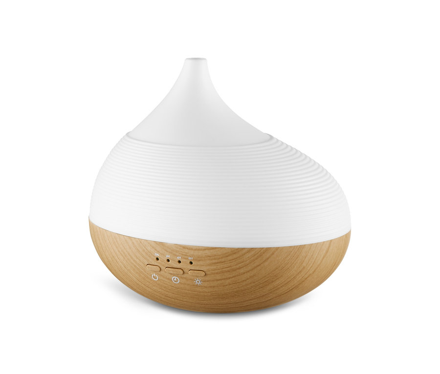 Weißer Aromadiffusor mit Wellness-Beleuchtung und Basis mit Holzstruktur.