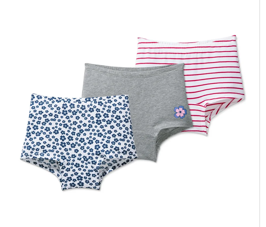 Drei Pantys: eine mit blauen Blumen, eine graue mit Blume, eine weisse mit roten Streifen.