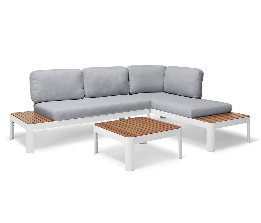 Loungemöbel-Set mit L-förmigem Sofa und Tisch.
