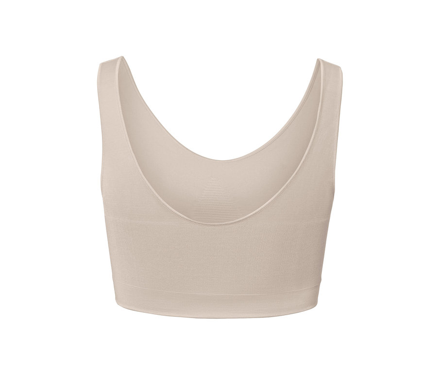 Ein nahtloses Bustier in Creme.