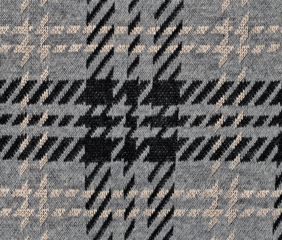 Detailaufnahme eines karierten Sweatshirts.