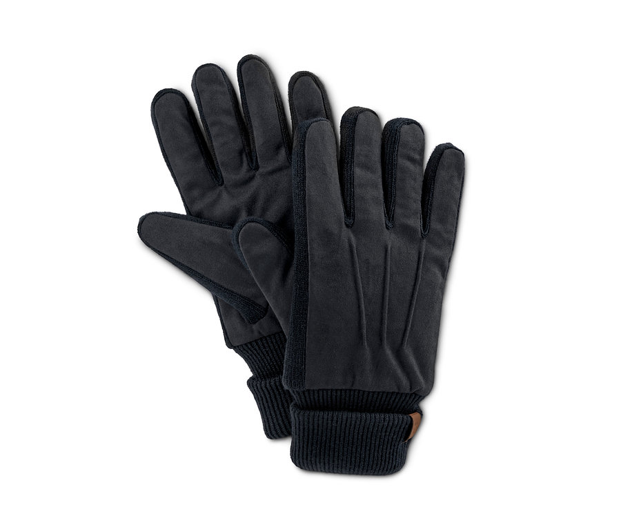 Zwei schwarze Handschuhe liegen übereinander.