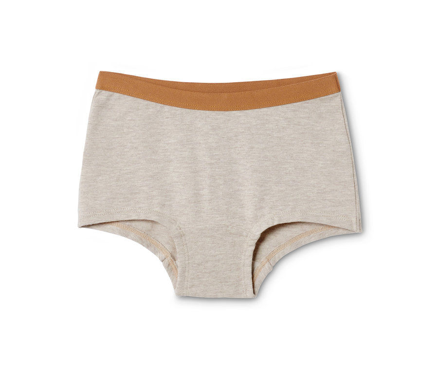 Eine einzelne hellbeige Kinder-Panty mit braunem Gummibund. Teil eines 3er Sets.