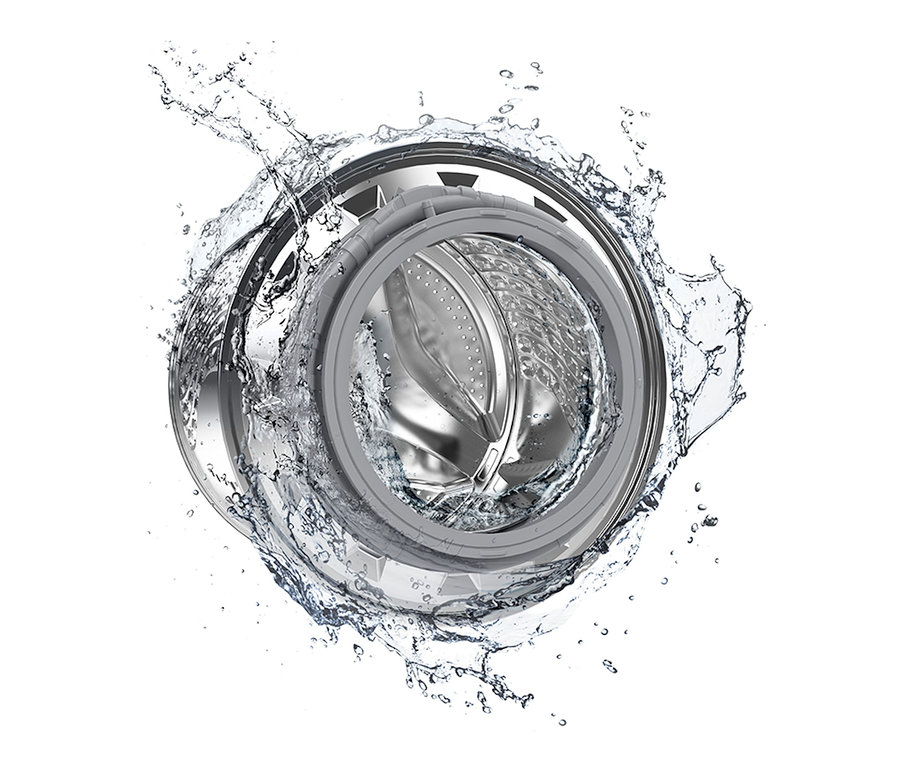 Detailaufnahme des Inneren einer Waschmaschine mit spritzendem Wasser.