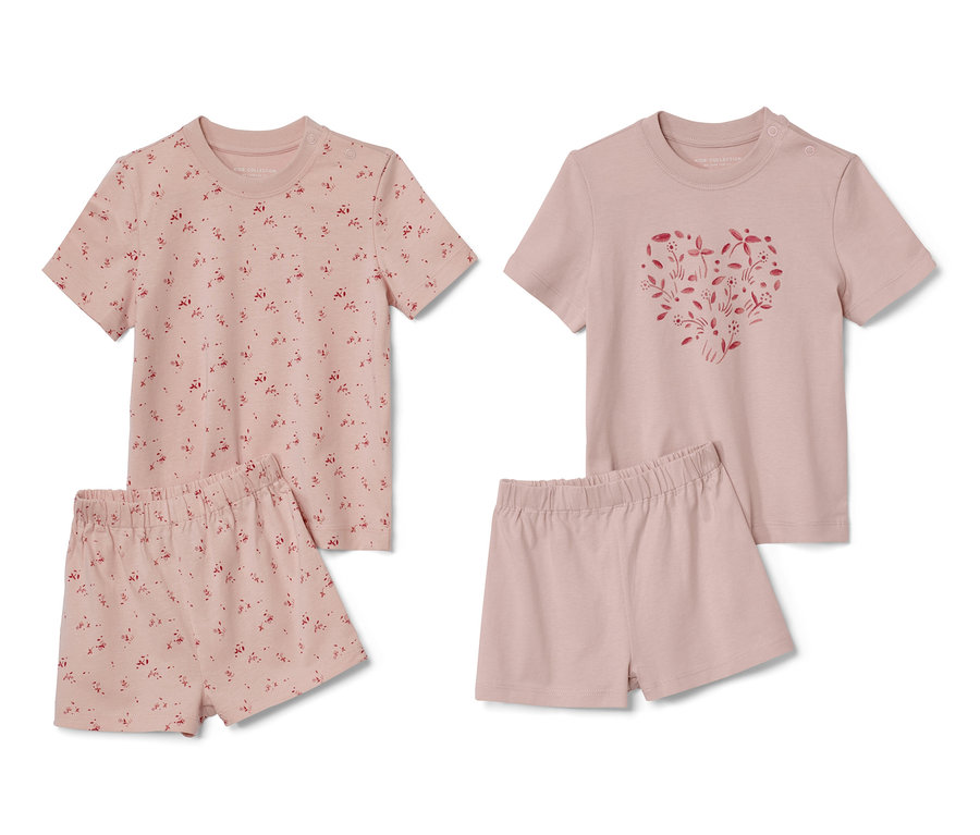 Zwei kurze Kleinkind-Pyjamas mit Blümchen.