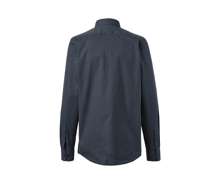 Detailansicht eines Hemdes in Modern Fit mit einem dunkelblauen geometrischen Muster.