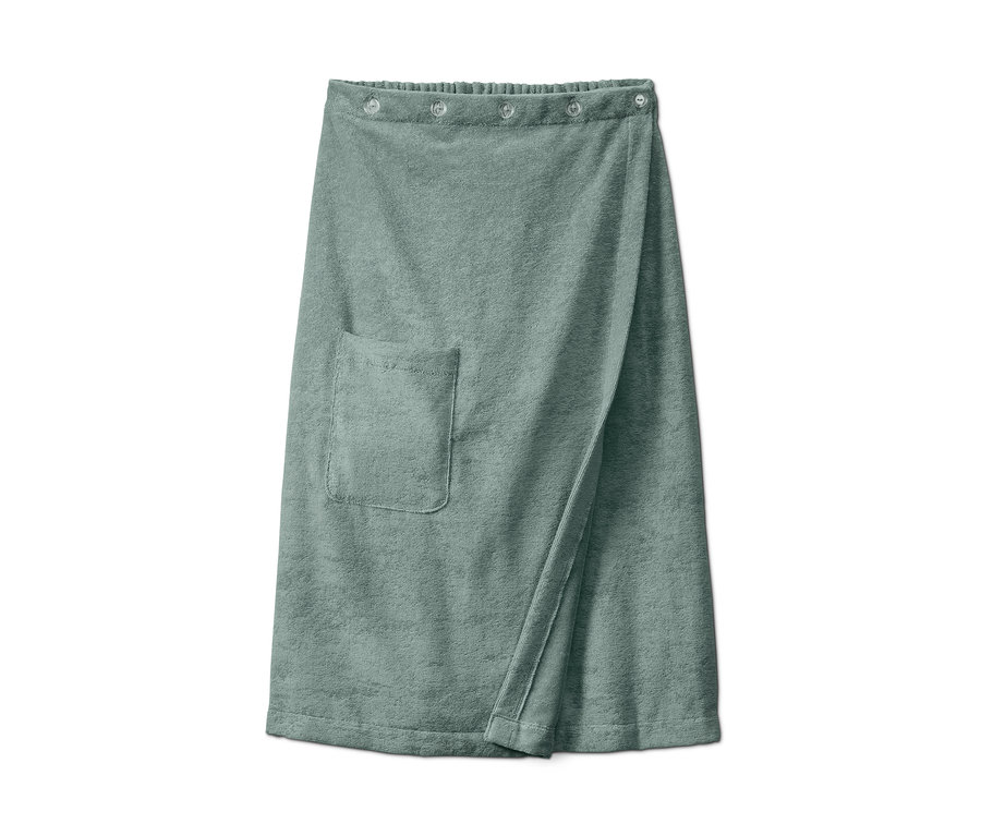 Ein grüner Sauna-Kilt mit einer Tasche.