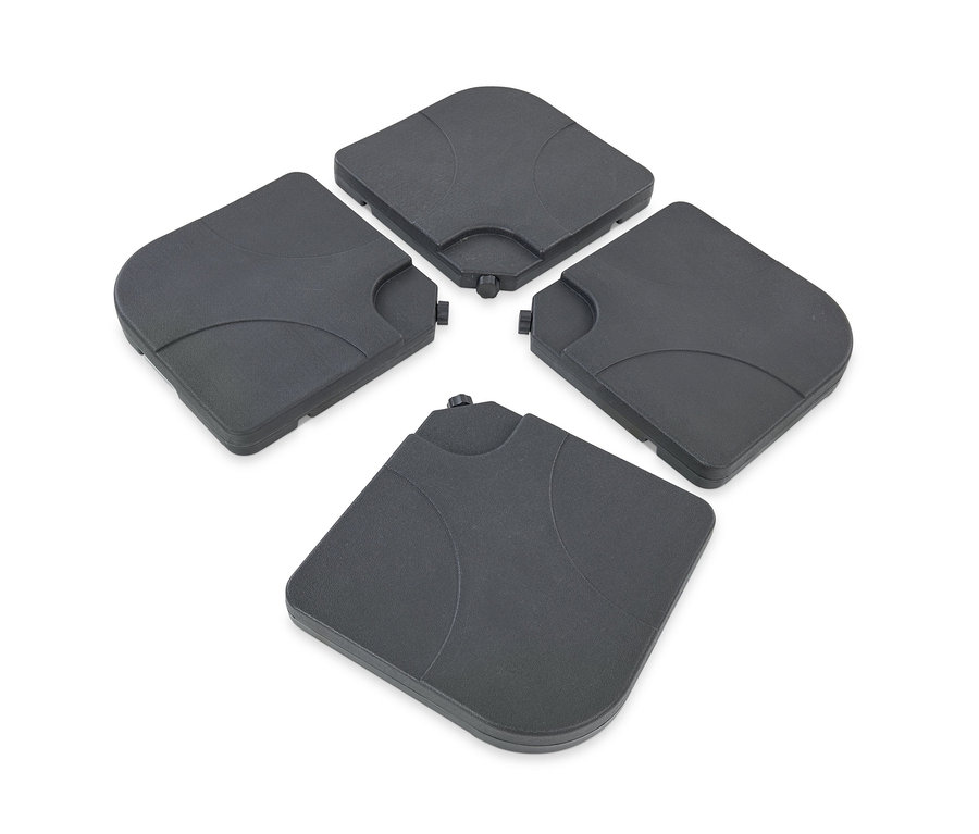 Vier schwarze Leco Plattenset für Kreuzständer sind kreisförmig angeordnet.